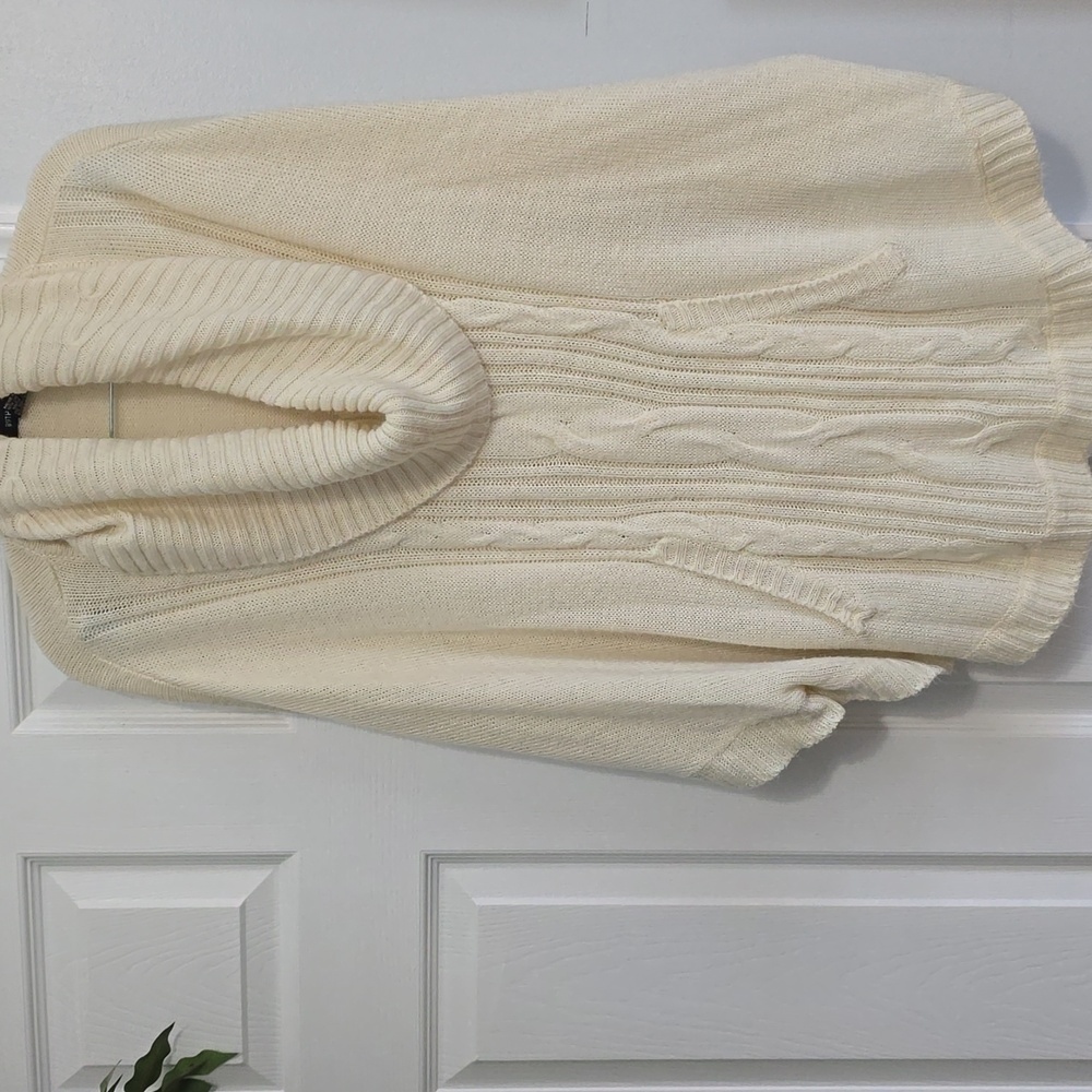 Cable knit poncho style sweater